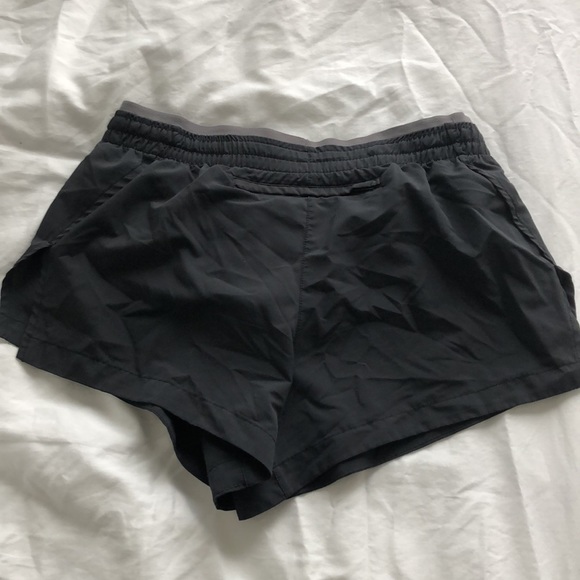 Nike dry fit workout shorts. 2” inseam. Lined. Has a Back pocket with a zipper. - Picture 2 of 3